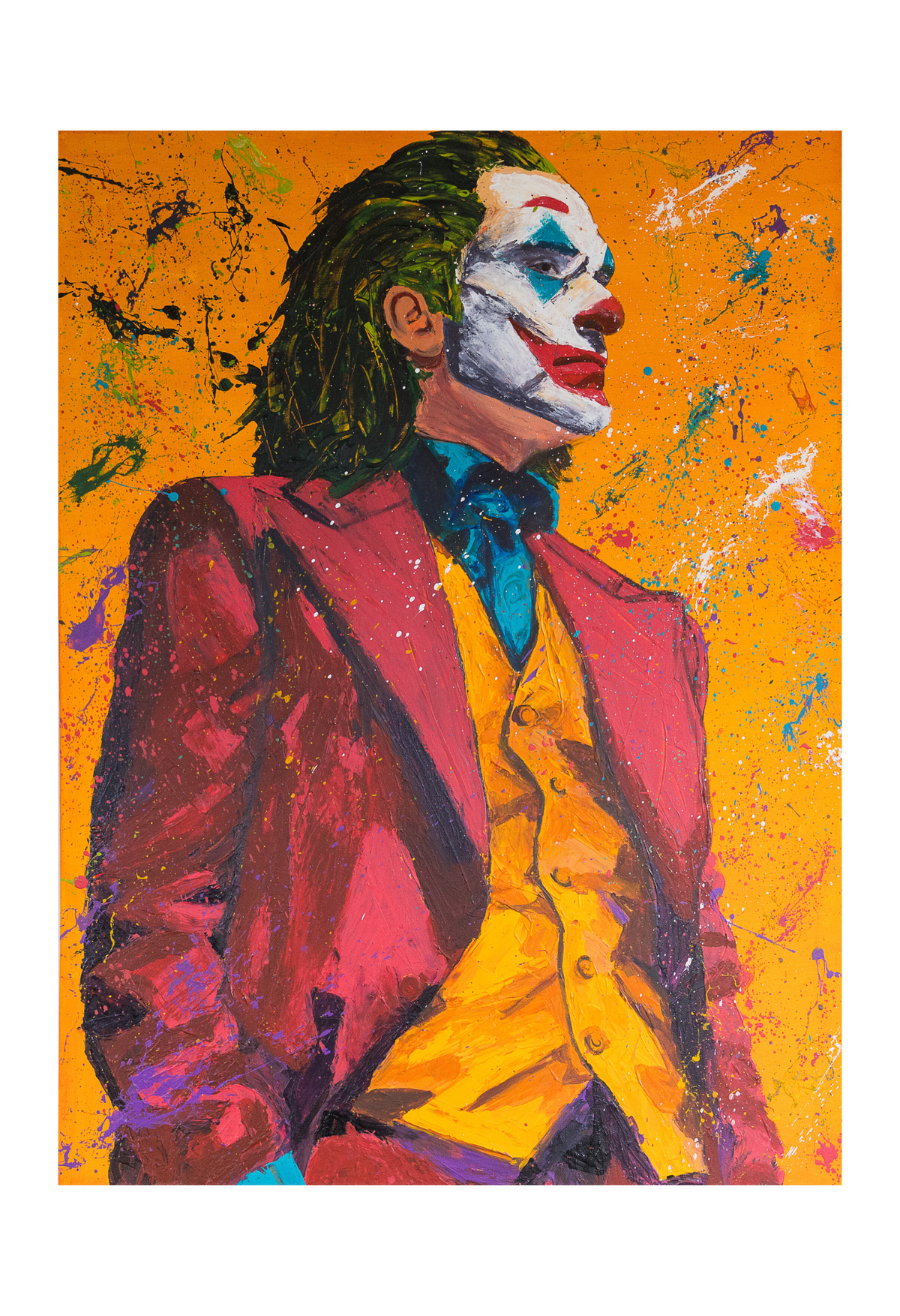 A vibrant pop-art style portrait print of the Joker, featuring his iconic white face paint, red lips, green hair, yellow vest, and red jacket against a bright orange background with colorful paint splatters.